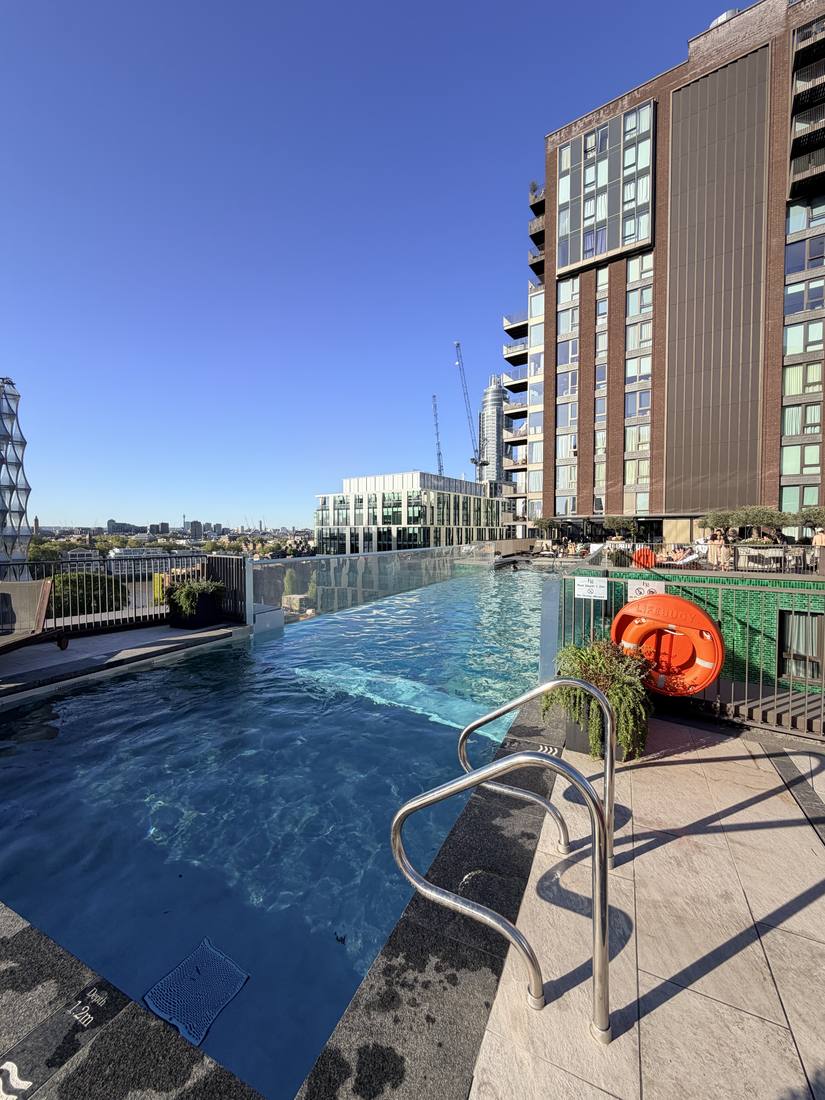 The rooftop pool deck on a clear summer day